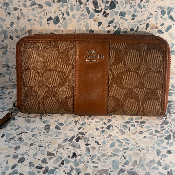 Coach Handbags - Coach Tan and Brown Signature Zip Wallet
PROJECT
